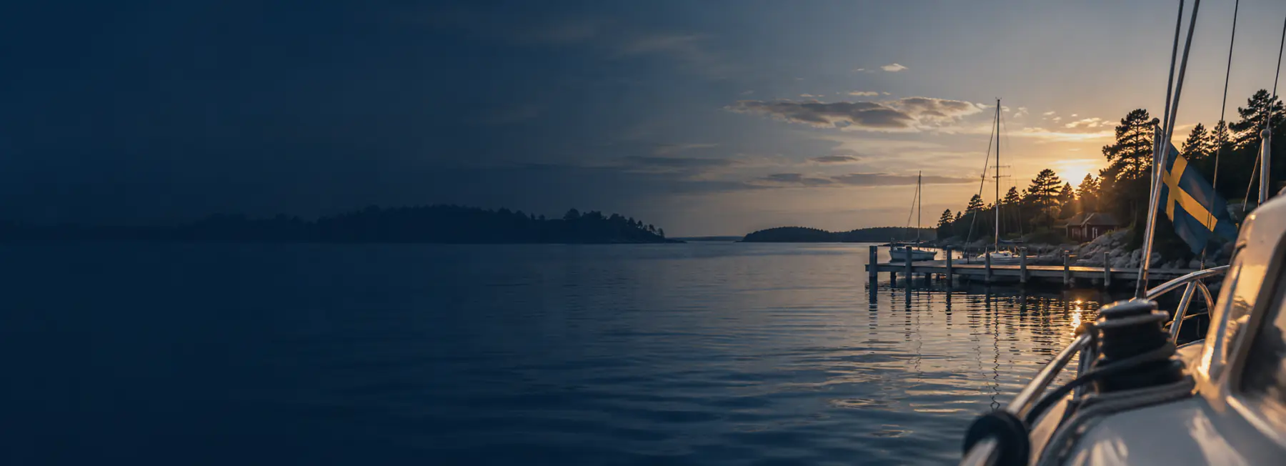 Boats moored at the harbour at dusk